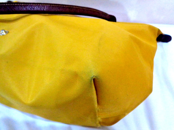 how to clean longchamp canvas bag